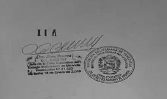 Sello y firma de la Zona Educativa en el reverso del título